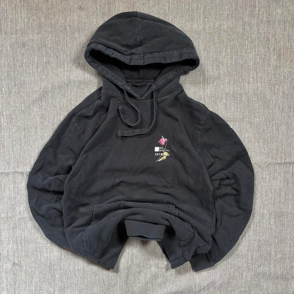 Black hoodie with pink and yellow accents